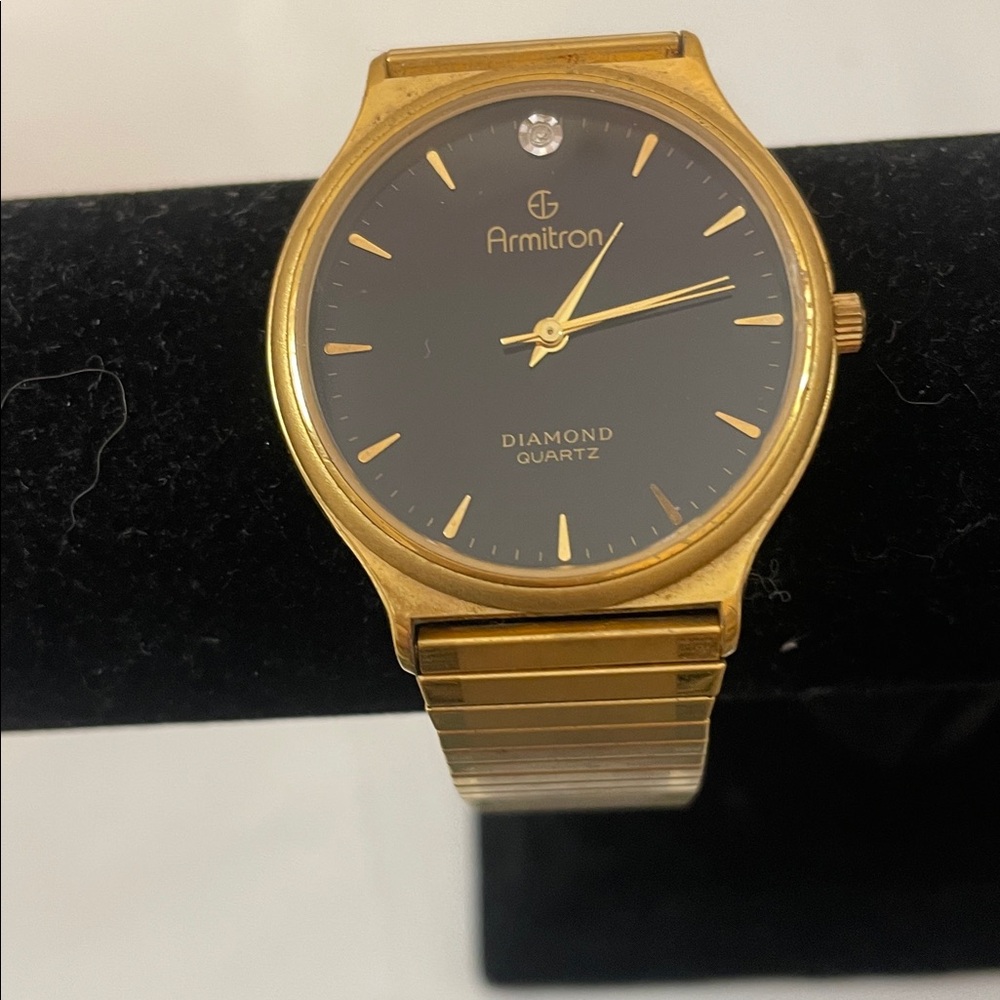Armitron Gold Tone Watch w/ Black Dial and Single Diamond Accent needs battery